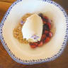 PistVanilla ice cream with cherries and 'edible' flowers.