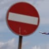 An aircraft takes off near a no-entry sign at Rome's Fiumicino airport, as European airlines monitor higher jet fuel costs and supply concerns amid the Iran war, in Fiumicino, Italy, June 6, 2026