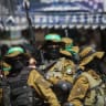 Masked gunmen from the Qassam brigade, the militia wing of Hamas, attend the funeral of Mazen Faqha in Gaza City, Saturday, March, 25, 2017. The former Palestinian prisoner whom Israel sent to Gaza after his release was found shot dead at the entrance of his house in Gaza City.