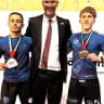NEWLY CROWNED world champion Guy Torres (left) and silver medalist Shalev Snir (right) pose with Israeli Ambassador to the United Arab Emirates Yossi Shelley during the medal ceremonies at the Junior World Jiu-Jitsu Championships in Abu Dhabi.