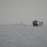 Vessels in the Strait of Hormuz, as seen from Musandam, Oman, August 3, 2026. 