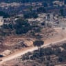 Israeli soldiers are seen inside southern Lebanon as seen from the Israeli side of the border, August 6, 2026.