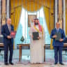 Turkish President Tayyip Erdogan, Saudi Crown Prince Mohammed bin Salman, and Pakistan's Prime Minister Shehbaz Sharif pose after signing a joint defence agreement in Mecca, Saudi Arabia, August 7, 2026.