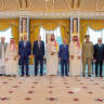 Turkish President Tayyip Erdogan, Saudi Crown Prince Mohammed bin Salman, and Pakistan's Prime Minister Shehbaz Sharif, accompanied by their ministers of Foreign Affairs and Defence, pose after signing a joint defence agreement in Mecca, Saudi Arabia, August 7, 2026.