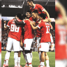 Hapoel Tel Aviv players celebrate after the Reds earned a 2-0 first-leg victory over Katowice in Conference League qualifying.