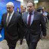 Israeli Prime Minister Benjamin Netanyahu (C) and his advisor Yoav Horowitz (R) arrive to attend the weekly cabinet meeting at his office in Jerusalem on September 3, 2017. (Photo by ABIR SULTAN / POOL / AFP) (Photo by ABIR SULTAN/POOL/AFP via Getty Images)