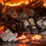 Books burn at the site of a book warehouse hit by a Russian drone strike, amid Russia's attack on Ukraine, in Kharkiv, Ukraine, August 1, 2026. Picture taken with a mobile phone.