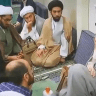Iranian Supreme Leader Mojtaba Khamenei (right) is seen in a screengrab of an undated video shared by Iranian state media on August 10, 2026