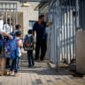 Young students arrive to the classroom at the opening of the new school year in a school for ultra orthodox jewish boys, in Beit Shemesh, August 28, 2022. 
