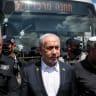 Israel’s Prime Minister Benjamin Netanyahu (C) and National Security Minister Itamar Ben-Gvir (R) visit the scene of a shooting at the Ramot road junction in Israeli-annexed east Jerusalem on September 8, 2025. 