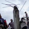 Volunteers and emergency personnel gather at the site of a collapsed building following an earthquake, in Cali, Colombia, August 10, 2026.
