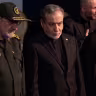 Iranian Foreign Minister Abbas Araghchi (second from right) and IRGC commander General Mohsen Rezaie (left) stand together during a ceremony in Tehran, Iran, July 3, 2026.