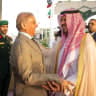 Pakistan's Prime Minister Shehbaz Sharif is received by Deputy Governor of Mecca region, Prince Saud bin Mishaal bin Abdulaziz upon his arrival in Jeddah, Saudi Arabia, August 6, 2026. 