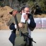 Rabbi Efraim Dochman of Colel Chabad embraces an IDF soldier during a visit to support troops serving on the front lines.