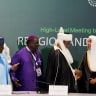 Islamic and Christian leaders exchange pleasantries during a high-level meeting titled "Religion and Building Social Harmony" at an international conference on diversity and social peace in Abuja, Nigeria, August 12, 2026. 