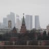 This photograph taken on February 13, 2025 shows the view of the Kremlin's towers with Moscow's International Business Centre (Moskva City) in the background in Moscow. 