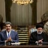  Iranian President Ebrahim Raisi and Venezuelan President Nicolas Maduro attend a news conference in Tehran, Iran, June 11, 2022.