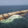 The damaged and half sunk oil tanker Caroline Bezengi, at sea off the coast of Oman, on a date given as August 6, 2026.