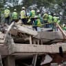 Rescuers work as search and rescue operations are under way at the site of the destroyed Cantabria building, following the earthquake in Cali, Colombia, August 15, 2026.