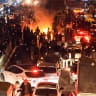  People gather during protest on January 8, 2026 in Tehran, Iran.