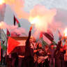Protesters take part in a pro-Palestinian demonstration marching towards Ullevaal Stadium ahead of the World Cup qualifier between Norway and Israel, in Oslo, Norway, October 11, 2025. 