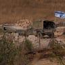 An Israeli military vehicle displaying an Israeli flag in southern Lebanon. August 16, 2026.