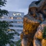 The Raytheon (RTX) headquarters building is framed by the trees and the US Marine Corps War Memorial, in Arlington, VA.  May 01, 2026.