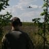 A Ukrainian serviceman from the 429th Separate Regiment of Unmanned Systems ACHILLES controls a FPV drone during a training flight in an undisclosed location, in eastern Ukraine on August 16, 2025, amid the Russian invasion of Ukraine. 