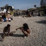 Migrants are seen in an improvised shanty camp in El Trampolin Beach on August 14, 2026 in Ceuta, Spain. Fears of a second surge of migrant crossings into the Spanish North African exclave of Ceuta have intensified following anonymous social media calls claiming that the border will open.