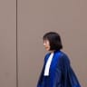 Judge Tomoko Akane arrives prior to the announcement of the International Criminal Court (ICC) verdict that sentenced Malian Jihadist police chief Al Hassan Ag Abdoul Aziz Ag Mohamed Ag Mahmoud to 10 years in jail for war crimes and crimes against humanity.