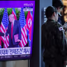 A South Korean soldier stands next to a TV broadcasting a news report on a possible summit between North Korean leader Kim Jong Un and US President Donald Trump, at a railway station in Seoul, South Korea, October 22, 2025. 
