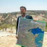 Israeli minister of Finance Bezalel Smotrich attends a press conference announcing his plans to approve more than 3,000 housing units in the E1 settlement project between Jerusalem and Ma’ale Adumim, August 14, 2025.