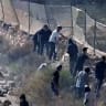 CCTV footage shows, as witnesses say, Jewish settlers throwing rocks on the road in Qusra, in the Israeli-occupied West Bank, August 12, 2026 in this screengrab taken from a handout video.