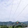 Ethiopian flags flutter in the wind next to a power station at the Grand Ethiopian Renaissance Dam (GERD), built along the Blue Nile, during its inauguration, in Guba, Benishangul-Gumuz region, Ethiopia, September 9, 2025.