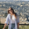The writer looks relaxed from her prime perch. 
