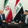 Iran's Parliament Speaker Mohammad Bagher Ghalibaf and Iraq's Prime Minister Ali al-Zaidi attend a meeting at the parliament building in Baghdad on August 19, 2026.