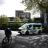 A Police van is parked outside of a warehouse park housing offices of a the Persian-language TV station, Iran International, in Wembley, northwest London on April 16, 2026.