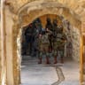 Israeli security forces guard as Jews tour  the West Bank city of Hebron, August 22, 2026