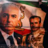A SUPPORTER holds a banner depicting Reza Pahlavi alongside his father, former shah Mohammad Reza Pahlavi. The Islamic Republic’s recent media campaign has repeatedly sought to undermine the exiled prince’s appeal and portray him as incapable of uniting Iran’s opposition.