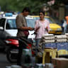 An Iranian woman shops in a local market in Tehran, Iran, April 28, 2026