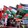 People hold Palestinian flags during a solidarity rally to mark the 78th anniversary of the Nakba to commemorate the mass dispossession of Palestinians in 1948, in Berlin, Germany May 16, 2026. 
