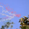 Gripen JAS 39 fighter aircraft of the Hungarian Air Force release trails of Hungary's national colours as they fly over the parliament building during a ceremony marking the country's national day attended by guests and ambassadors accredited to Hungary on August 20, 2026, in Budapest.