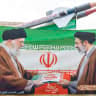  Images of Iran's late Supreme Leader Ali Khamenei and new Supreme Leader Mojtaba Khamenei with replicas of missiles seen during a gathering in Tehran, Iran, August 12, 2026