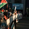 Hundreds of pro-Palestine activisits, carrying the flags of Palestine and Lebanon, march in Toronto, Canada, on October 20, 2024 to show solidarity with Palestinians.
