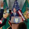Reporters ask US Treasury Secretary Scott Bessent questions after he announced a new set of sanctions against Iran, describing them as "an economic D-Day", in the Cash Room at the Treasury Department on August 24, 2026 in Washington, DC.  