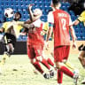 Bnei Sakhnin midfielder Modestas Vorobjovas (in yellow) and Maccabi Netanya’s Aziz Ouattara (8) vie for the ball during their teams’ season-opening goalless draw. 