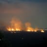 Smoke rises from fires ignited by Israeli shelling that targeted the plain of Marjayoun in southern Lebanon on August 25, 2026. 