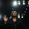 Lisa DeNell Cook, a member of the Board of Governors of the Federal Reserve System, is sworn in during a Senate Banking nominations hearing on June 21, 2023 in Washington, DC.