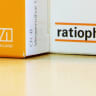 Boxes of medication by German pharmaceuticals company Ratiopharm and Israeli pharmaceutical company Teva stand next to each other at a pharmacy.