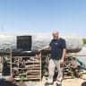 YARON BOB stands next to a remnant of an Iranian ballistic missile in the backyard of his blacksmith studio in Yated. 